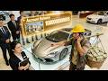 Poor man mocked in luxury car dealer, one call makes it bankrupt.