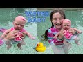 SILICONE BABY MIMI'S FIRST TIME SWIMMING