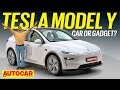 2026 Tesla Model Y Review - high-tech gadget disguised as a car | Autocar India