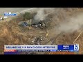 Northbound lanes of 110 Freeway remain closed as homeless camp continues to burn